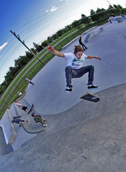 Neil ryder Skateboarding kickflip at riley skate park in farmington michigan Photography